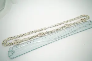 64 -  Lang (70cm) Surinaams 1e geh. zilveren konings collier met mattenkloppers kopen? Bied vanaf 220!