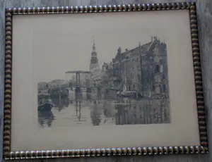 Willem Witsen - Ingelijste ets: Pakhuis op Uilenburg en de Montelbaanstoren Amsterdam kopen? Bied vanaf 299!
