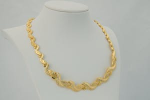 1225 - Fraaie SET - 18 KRT / geel-gouden "gedraaide schakel" armband en collier kopen? Bied vanaf 1220!