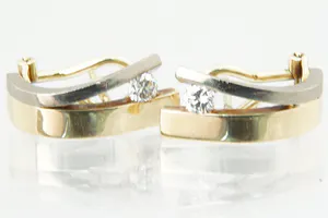 Prachtige set 18 krt bi-color gouden dames oorclips gezet met ca 0.30ct diamant. kopen? Bied vanaf 350!