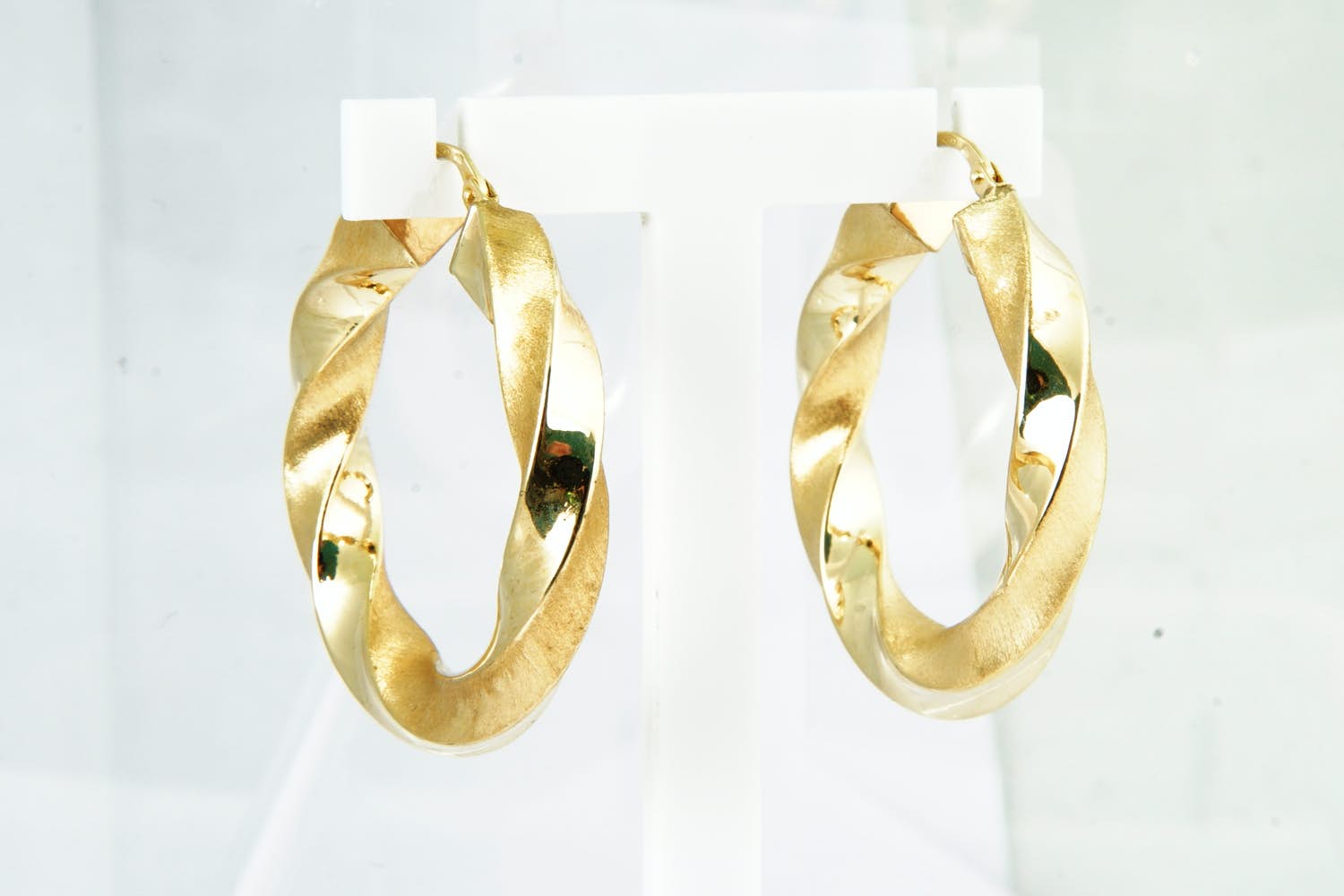 10 -  Elegante set 18 karaats geel-gouden "gedraaide" oorhangers - groot model kopen? Bied vanaf 170!