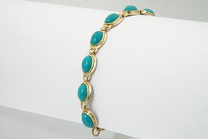 2062- elegante 14 karaats geel-gouden armband gezet met turkoois edelstenen. kopen? Bied vanaf 210!