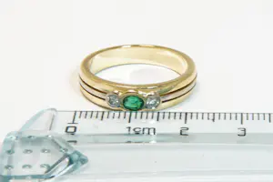 32 - 18 karaats gouden bicolor ring met diamant ca 0.10 crt briljant kopen? Bied vanaf 480!