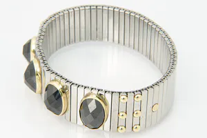 Opvallende staal en 18 krt gouden NOMINATION armband - met 4 grote stenen kopen? Bied vanaf 120!