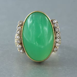 14k gouden ring bezet met chrysopaas en bolsjewiek geslepen diamant 0.20ct kopen? Bied vanaf 400!