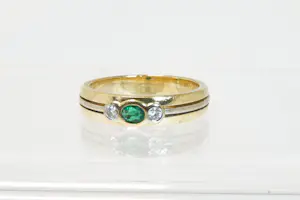 32 - 18 karaats gouden bicolor ring met diamant ca 0.10 crt briljant kopen? Bied vanaf 480!