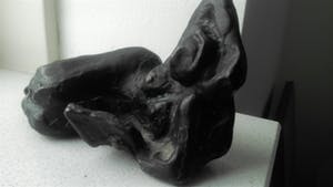 Brons (Onbekend) - liggend lezende vrouw JVG kopen? Bied vanaf 39!