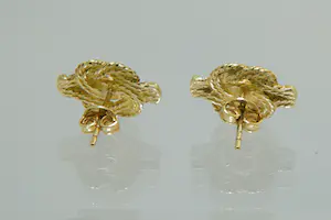 100 -  Leuk paar 18krt gouden mattenklopper oorstekers met rode steentjes kopen? Bied vanaf 150!