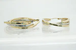 22 - Mooi paar 14 karaat gouden bicolor oorclips - "in elkaar gedraaid" model kopen? Bied vanaf 195!