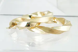 10 -  Elegante set 18 karaats geel-gouden "gedraaide" oorhangers - groot model kopen? Bied vanaf 170!