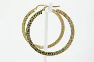 83 - Elegante z.g.a.n. set 14krt geelgouden oorringen met meander motief kopen? Bied vanaf 130!