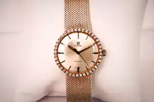 Vintage sixties Omega 18 Krt witgoud & diamant "buddy Holly" horloge - 40 brilj. verkocht voor € 1760!