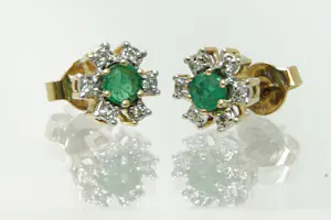 61 - 14 karaats geelgouden paar oorstekers met diamant ca 0.06 crt achtkant kopen? Bied vanaf 130!