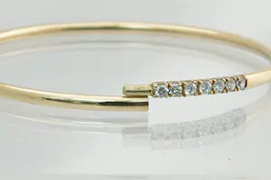 63 - Sierlijke, ronde 14 karaat geel gouden holle armband kopen? Bied vanaf 160!