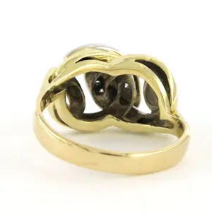 14k bicolour gouden ring bezet met briljant geslepen diamant tot. 0.15ct kopen? Bied vanaf 750!