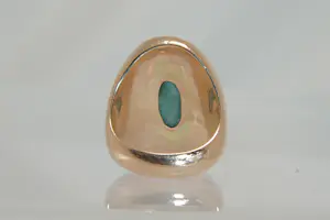 77 - Beneden wettelijk roségoud gehalte ring met ovale groene steen kopen? Bied vanaf 280!