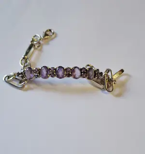 Nieuw zilveren armband gezet met 5 grote facetgeslepen Amethist en 6 kleine kopen? Bied vanaf 85!