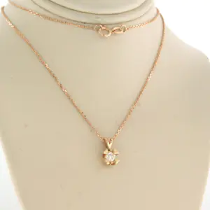 14k gouden collier en solitair hanger met Bolsjewiek geslepen diamant tot.0.19ct kopen? Bied vanaf 260!