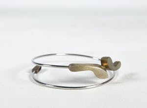 Jantine Koeze - Spang-armband met bronzen en zilveren voetjes kopen? Bied vanaf 1!