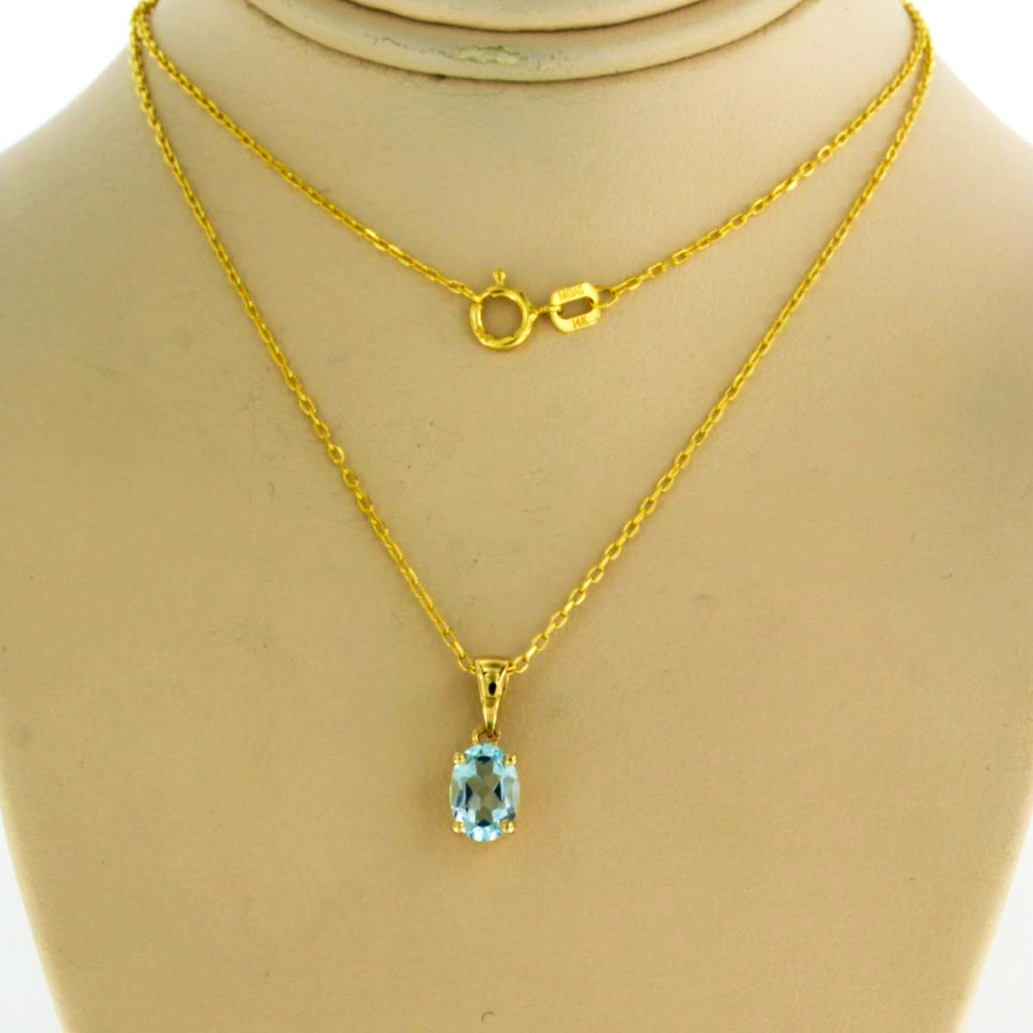 14k geel gouden collier met hanger bezet met blauwe topaas tot. 0,90ct kopen? Bied vanaf 130!