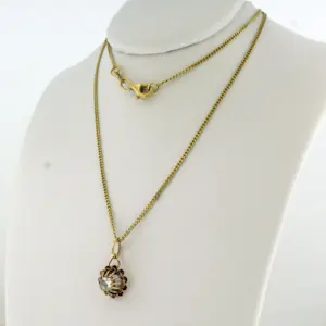14k gouden collier en hanger met roos geslepen diamant totaal circa 0.25ct kopen? Bied vanaf 360!