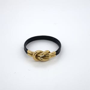 18kt gouden ring+olifantenhaar, maat 51/16,25, 0,46 gr kopen? Bied vanaf 50!