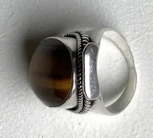 Zilver - twee 925 ringen met barnsteen en tijgeroog - 18 en 19 mm kopen? Bied vanaf 85!