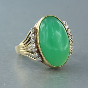 14k gouden ring bezet met chrysopaas en bolsjewiek geslepen diamant 0.20ct kopen? Bied vanaf 400!