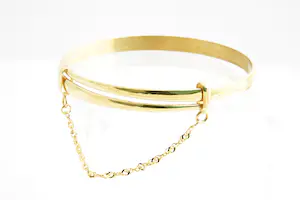 39 - Fraaie 18 karaats geel-gouden en gefaseerd afgewerkte schuif amband kopen? Bied vanaf 760!