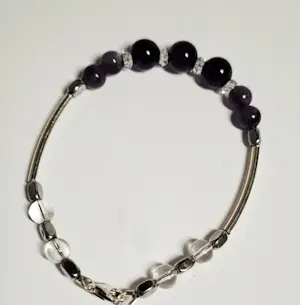Nieuwe zilveren armband met Amethist edelsteen en bergkristal kopen? Bied vanaf 70!