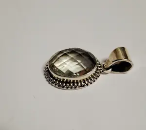 Nieuwe Zilveren hanger met facetgeslepen licht groene Amethist kopen? Bied vanaf 60!