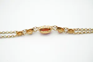 Elegante 14 karaats geel-gouden dames armband gezet met bloedkoraal kopen? Bied vanaf 240!