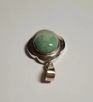 Nieuwe  zilveren hanger in de vorm van een klavertje vier  met een Turkoois kopen? Bied vanaf 60!