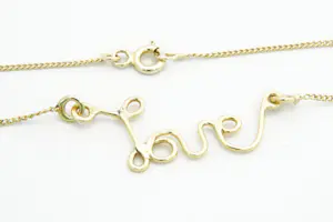 51 - Elegant en fijn 14 karaats geel-gouden "Love" collier - klein model kopen? Bied vanaf 110!