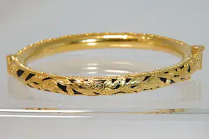 29 - Gedeeltelijk 20 karaats geelgouden ajour bewerkt armband met kunststof kern kopen? Bied vanaf 750!