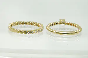 19 - Twee 14 karaats geelgouden Blusch ringen kopen? Bied vanaf 260!