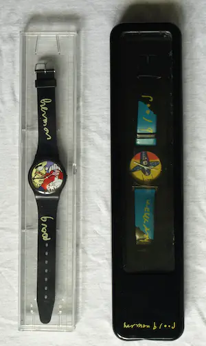 Herman Brood - 2x Horloge , “Erik Satie” en “Vliegtuig” – met doosjes kopen? Bied vanaf 1!