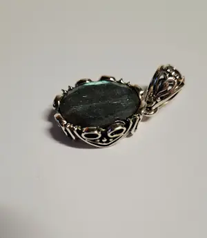 Nieuw zilveren hanger met facetgeslepen labradoriet kopen? Bied vanaf 60!