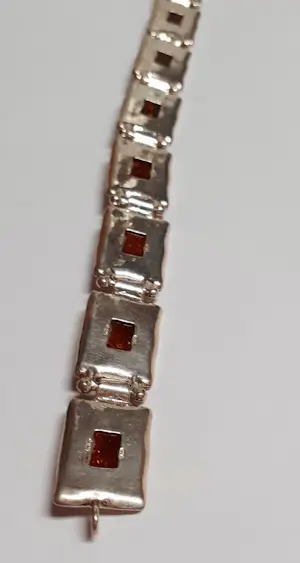 AcheterIn nieuwstaat .Zilveren armband bezet met natuurlijke rechthoekige Barnsteen? Enchérissez de 100!