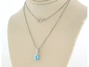 14k wit gouden collier met hanger bezet met topaz tot. 0,85ct kopen? Bied vanaf 160!