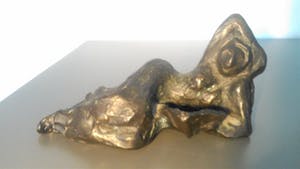 Brons (Onbekend) - liggend lezende vrouw JVG kopen? Bied vanaf 39!