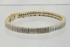 Acheter19 - 18 karaats geelgouden armband met ca 13 crt princess geslepen diamanten? Enchérissez de 4850!