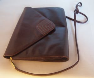 Niet of onleesbaar gesigneerd - Italiaanse Vintage Bruin Leren Clutch of handtas van Ballin kopen? Bied vanaf 10!