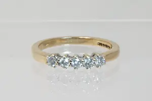 37 - Beneden wettelijk bicolor goud gehalte diamanten rijring met ca 0.25 crt kopen? Bied vanaf 180!