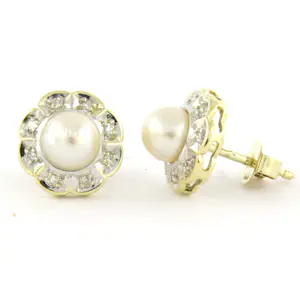 14k gouden oorknoppen bezet met parel en single cut geslepen diamant tot. 0.06ct kopen? Bied vanaf 310!