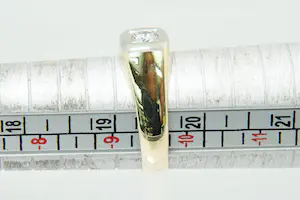 87 - Zo goed als nieuwe 14krt gouden solitair ring met 0.31ct top (H/vs) diamant kopen? Bied vanaf 270!