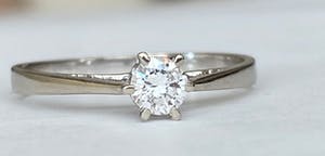 18 karaat witgouden ring met diamant ca  0.23 ct kopen? Bied vanaf 350!