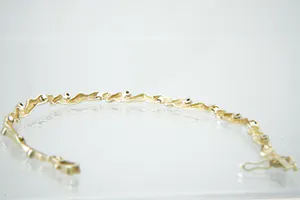 Chique gouden (14krt) & diamanten (0.10ct) "Slinger / Guirlande" armband kopen? Bied vanaf 230!