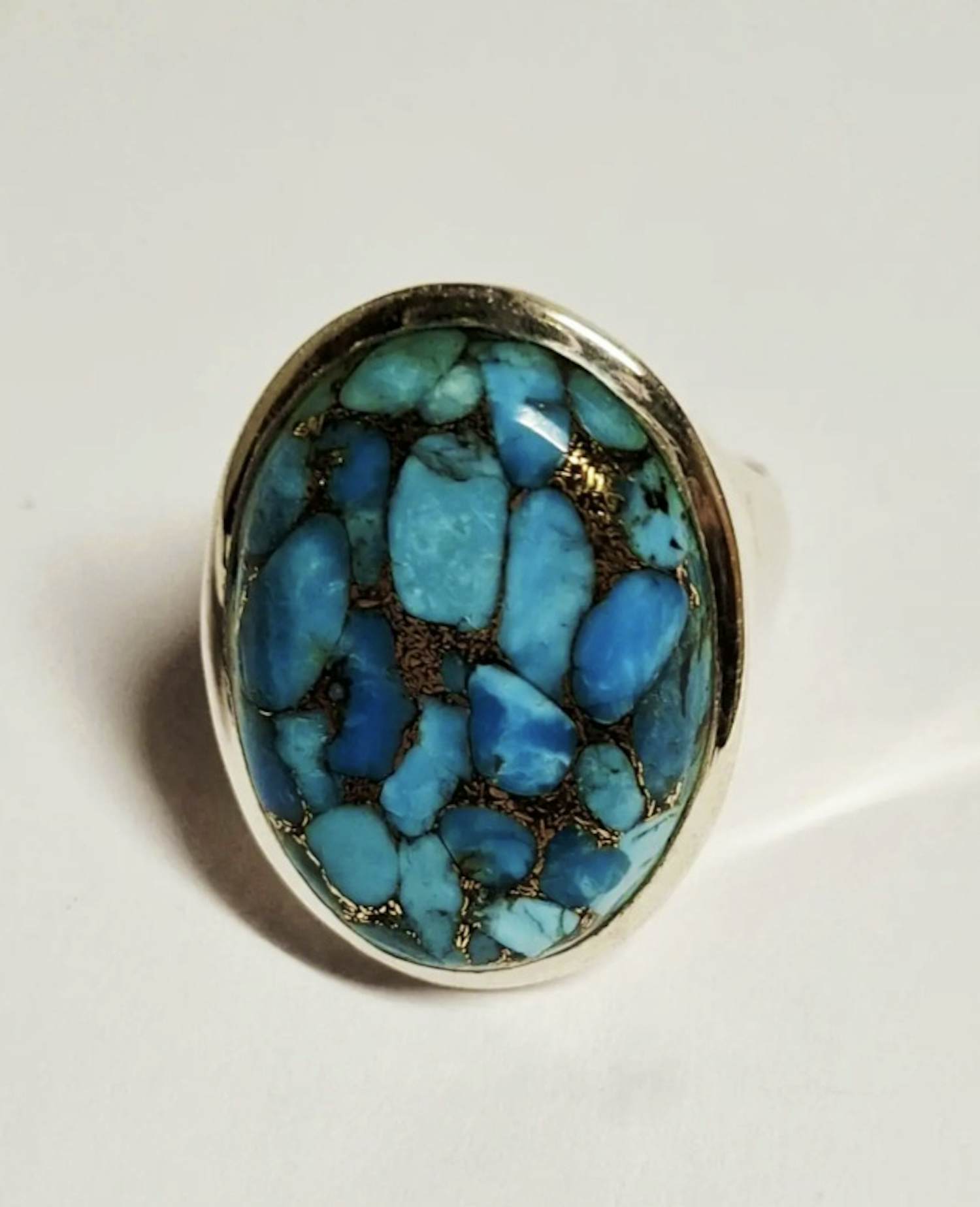 Nieuwe zilveren ring met ovale hoogglans turkoois kopen? Bied vanaf 75!