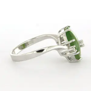 14k wit gouden ring bezet met jade en briljant geslepen diamant tot. 0.10ct kopen? Bied vanaf 350!